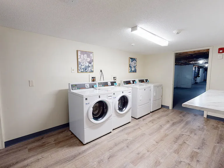 Newly renovated laundry with mobile app/no coins needed in every building!