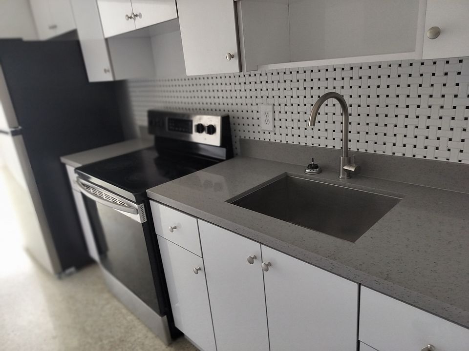 Kitchen with new appliances and renovated counters