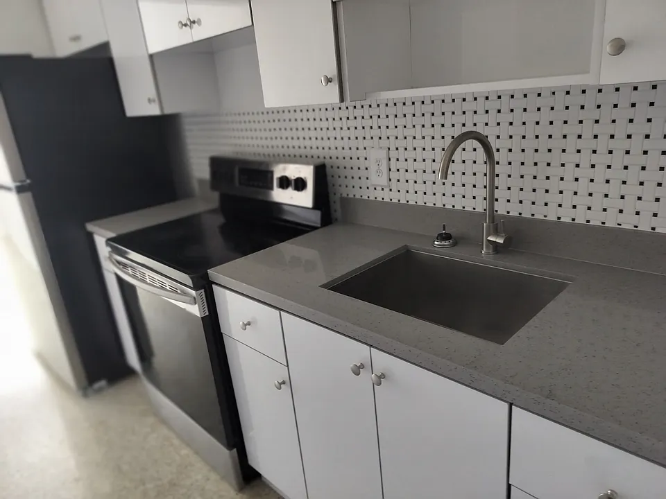 Kitchen with new appliances and renovated counters