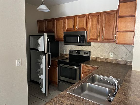 4th image of 6157 Metrowest Blvd Unit 105