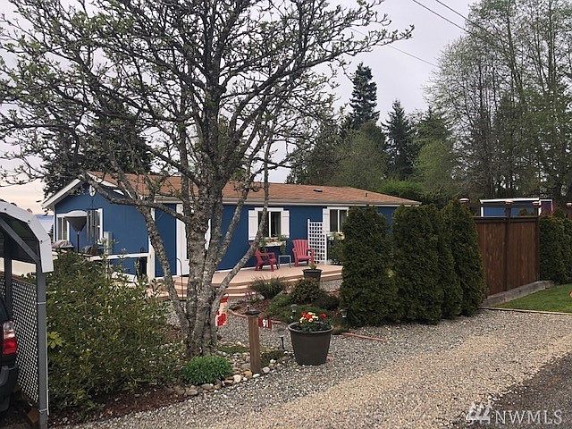 Fresh and clean inside and out....front porch and water view deck in back!