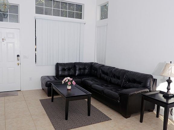 Huge living room with Ashley leather furniture