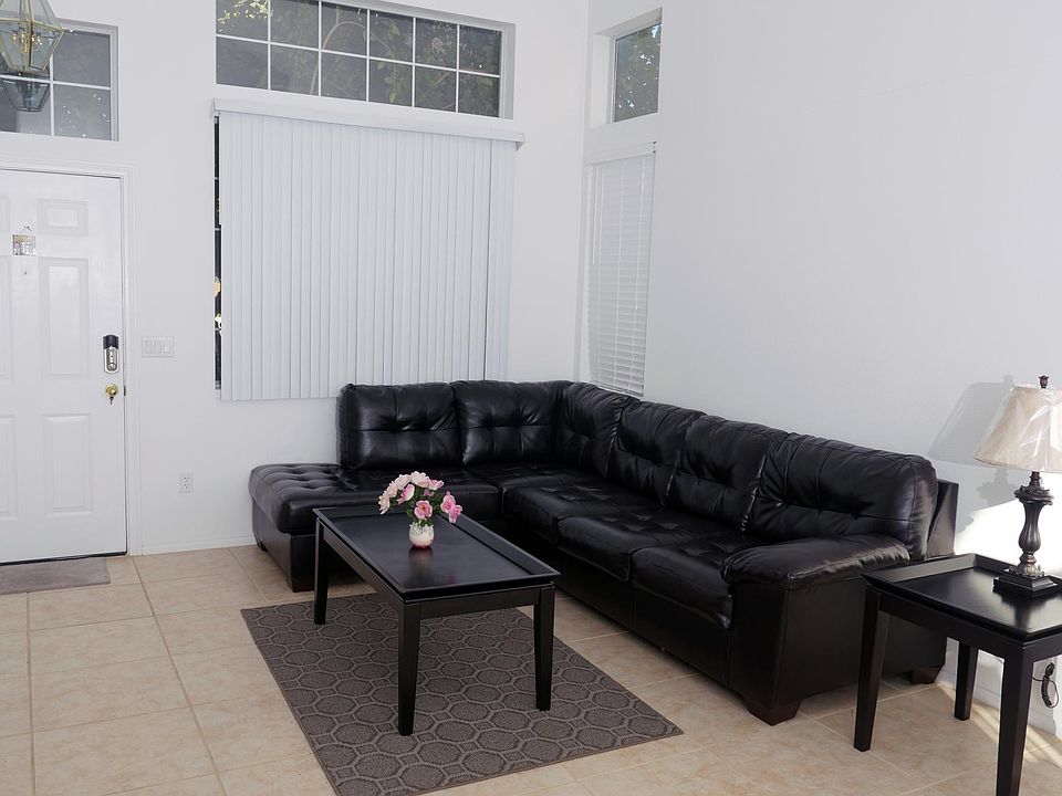 Huge living room with Ashley leather furniture