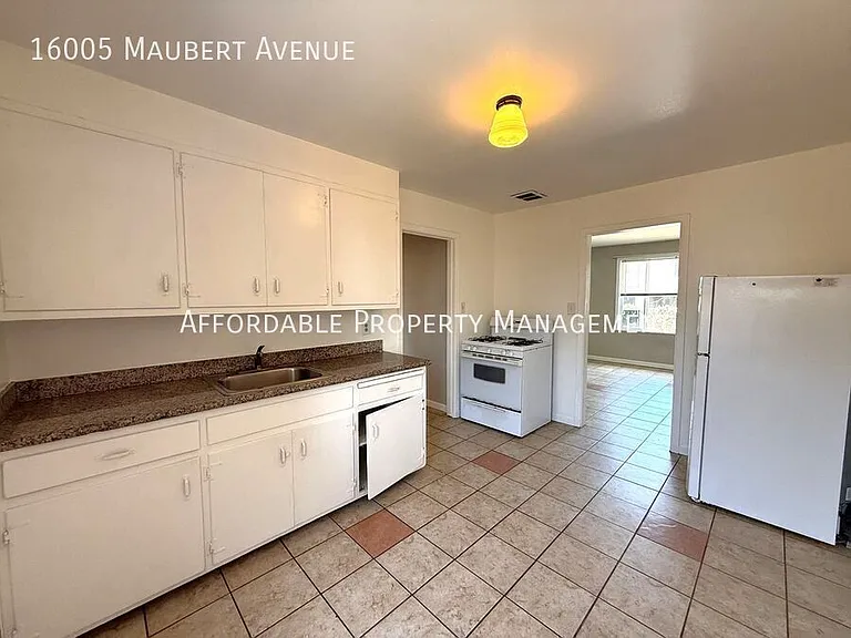 16005 Maubert Ave — Photo 8