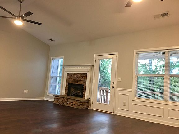 Living room with vaulted ceilings