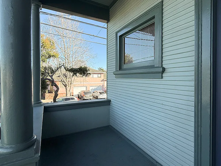 Front porch (building was repainted in July _ this photo shows the previous paint color)