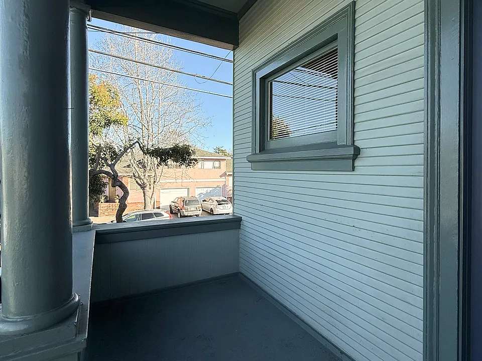 Front porch (building was repainted in July _ this photo shows the previous paint color)