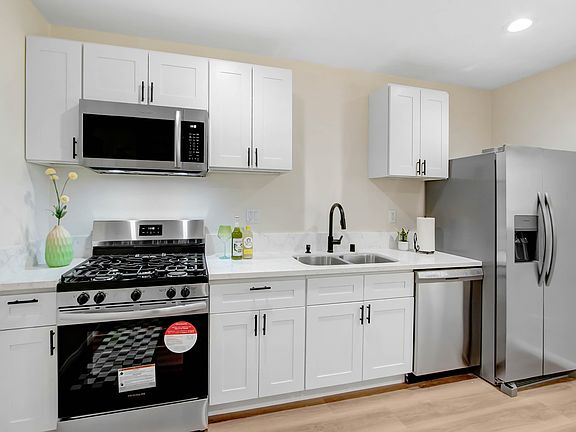 New Cabinets, Fridge, Microwave, Dishwasher