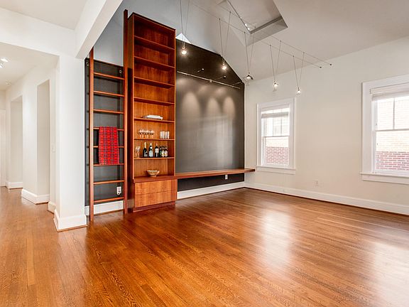 Dining room with amazing vaulted ceilings a skylight that has shades!
