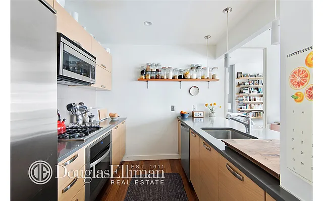 Sold by Douglas Elliman | media 12