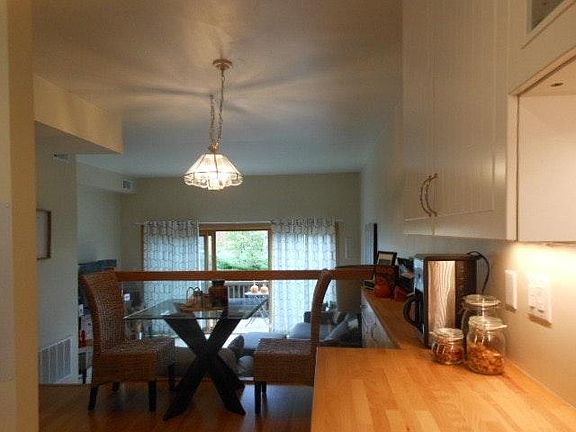 View from kitchen to dining room reveals the glass & oak div