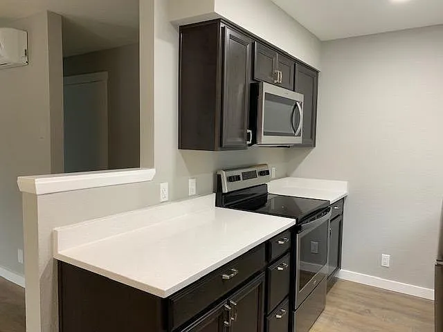 Kitchen looking out to living room