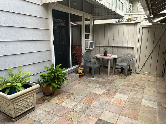 Courtyard entry. Part of house but closed off.