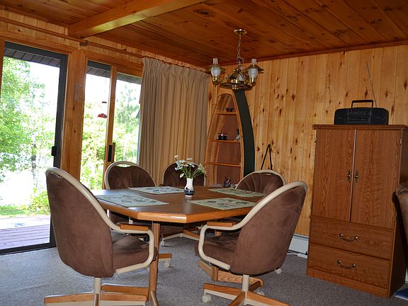 dining area looks out on lake