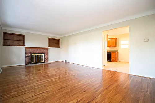 Sprawling 3BR/1.5BA Brick Ranch on a Huge Lot with Hardwoods, Finished Basement, CA, and 2.5 Car ... — Photo 2
