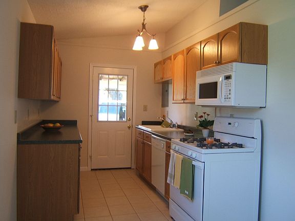 Oak cabinets, built in microwave, dishwasher