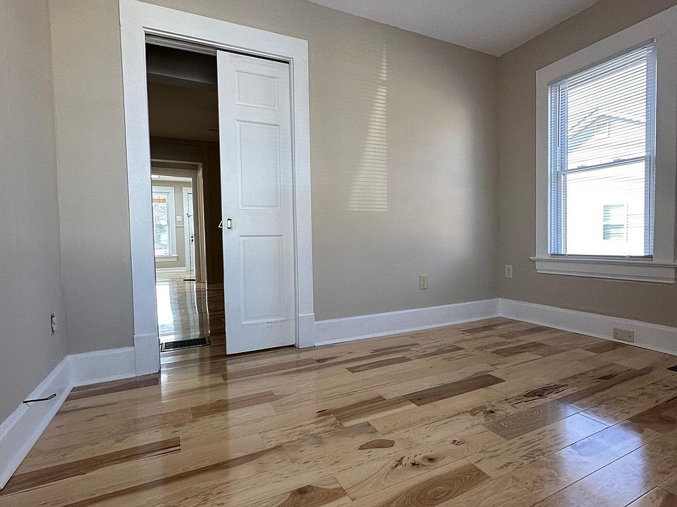 Living room with pocket door to bedroom