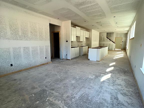 Construction progress - family room open to kitchen and dining area