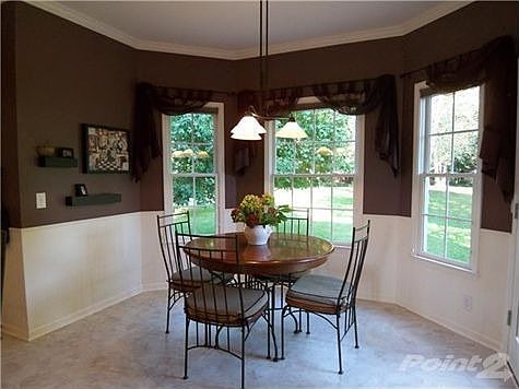 The Breakfast room is spacious and has a lovely view to the private backyard