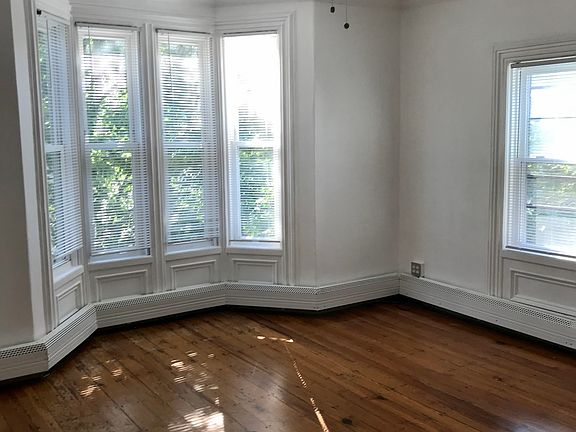 Beautiful windows let in loads of light. Original hardwood floors.
