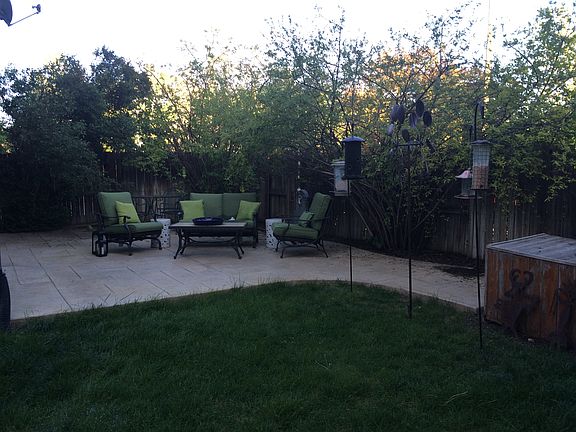 private patio, grill and fenced yard