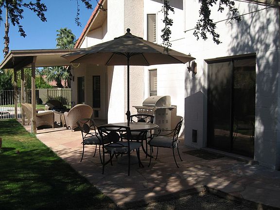 Flagstone patio with french doors to kitche and separate door to the Master...