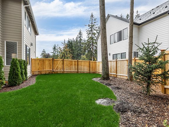 Fenced landscaped yard