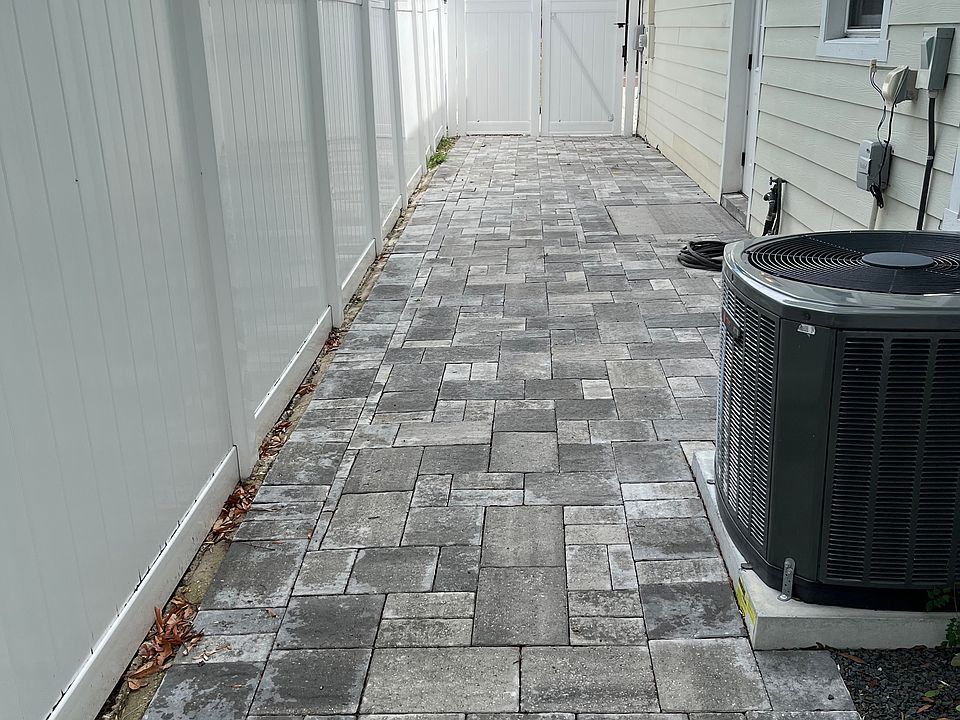 View of the Courtyard from the fence toward the driveway.