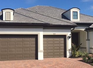 7453 Winding Cypress Dr, Naples, FL 34114