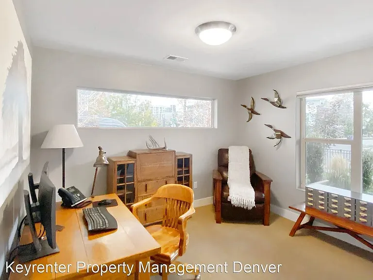 Downstairs bedroom or office with closet and adjoining bathroom with shower