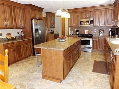 All new kitchen with abundance a cabinetry, beautifully designed, top of the line flooring & more.
