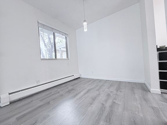 Quaint dining area adjacent to kitchen.