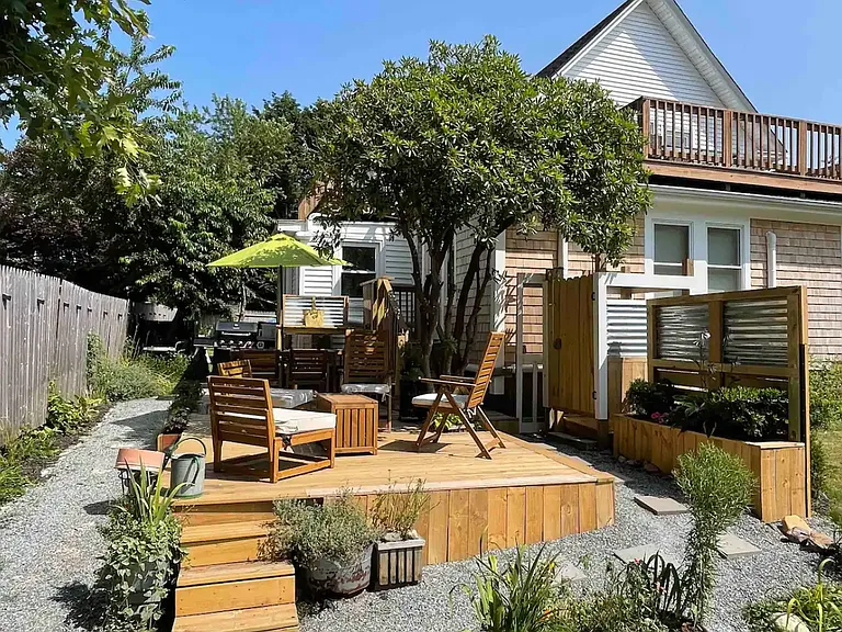 Deck, grill, outdoor shower, parking area