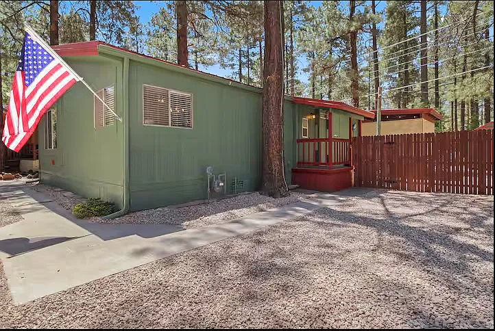 The home is surrounded by tall pines and backs up to the forest. It doesn't get any more peaceful than this!