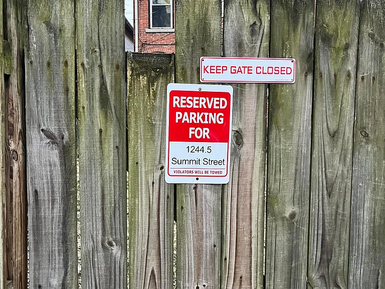 One dedicated parking spot in back. Off-street parking in front.