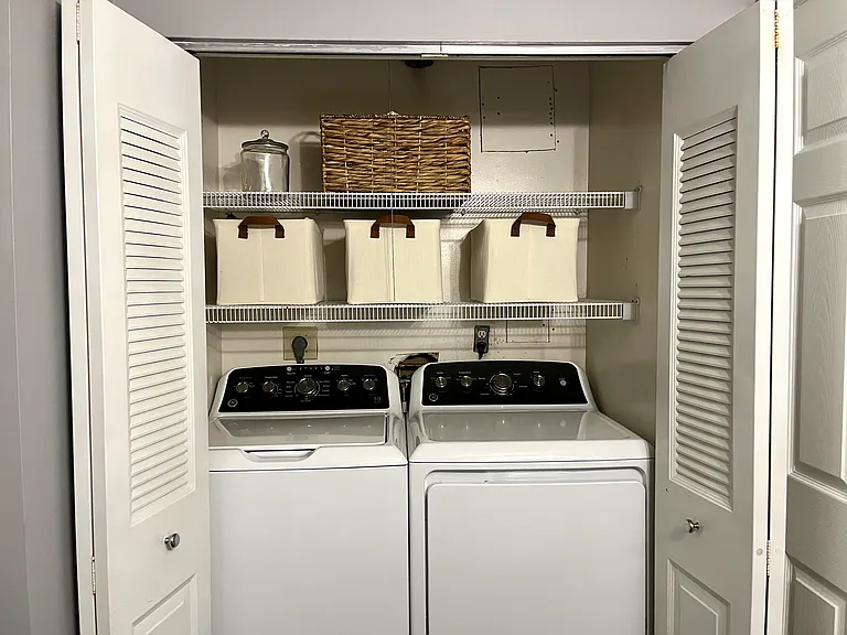 Upstairs shared bathroom - laundry closet