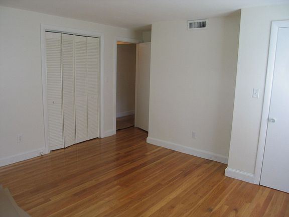 Master bedroom with hardwood floors