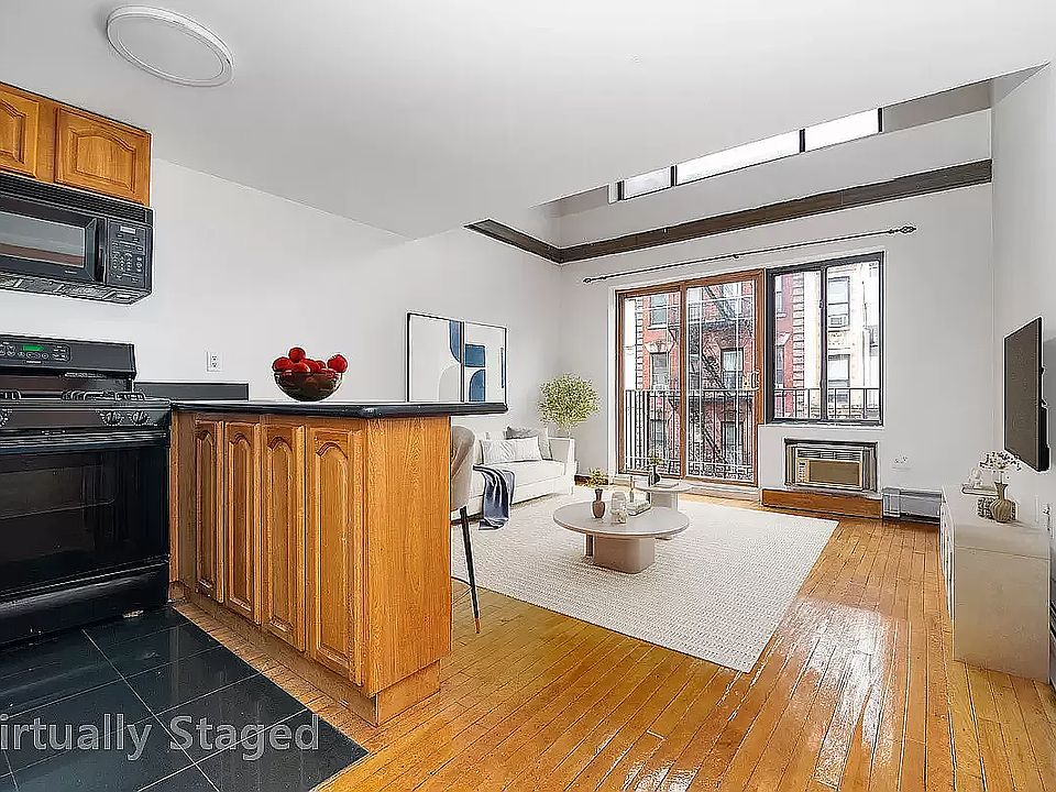 1st image of 212 E 10th St APT 4A