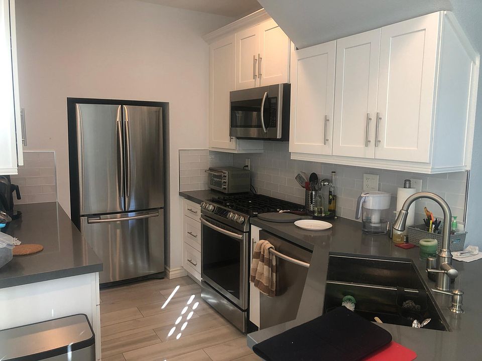 Modern Kitchen with stainless steel appliances.