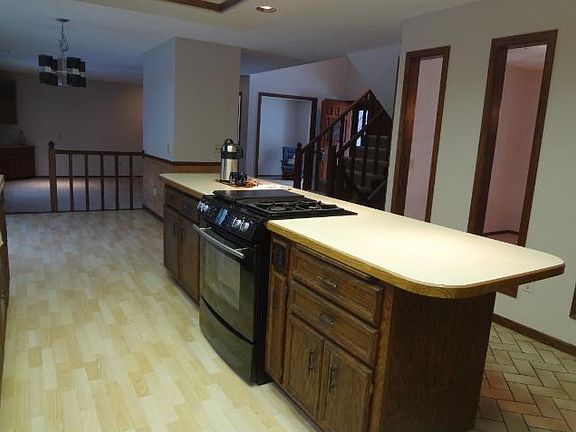 Another view of the kitchen - note the formal dining room that opens up to the kitchen. Perfect for a nice, open feel.