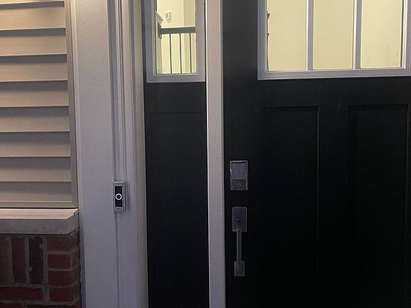 Entrance door. 
Includes Ring door bell camera with automatic recording features that connects to your phone