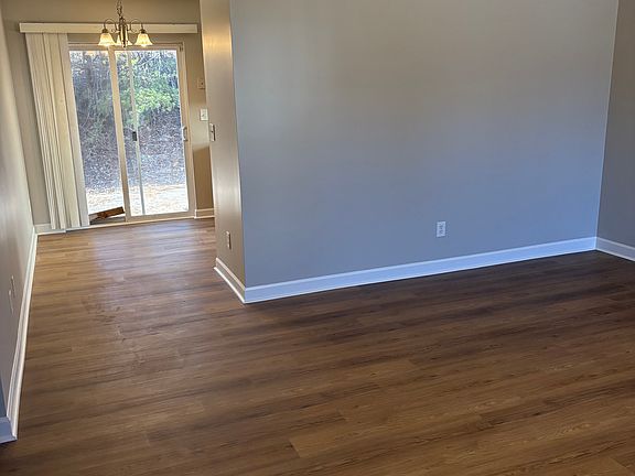 Living room with entry into kitchen