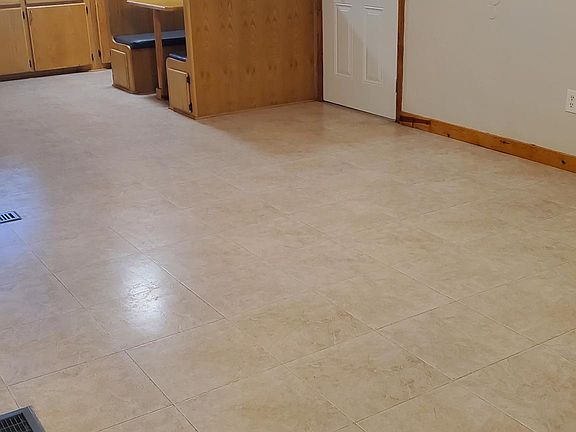 View of living room and main entrance from the hallway.