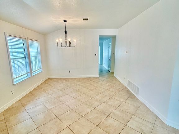 Formal dining room attached to front living room.