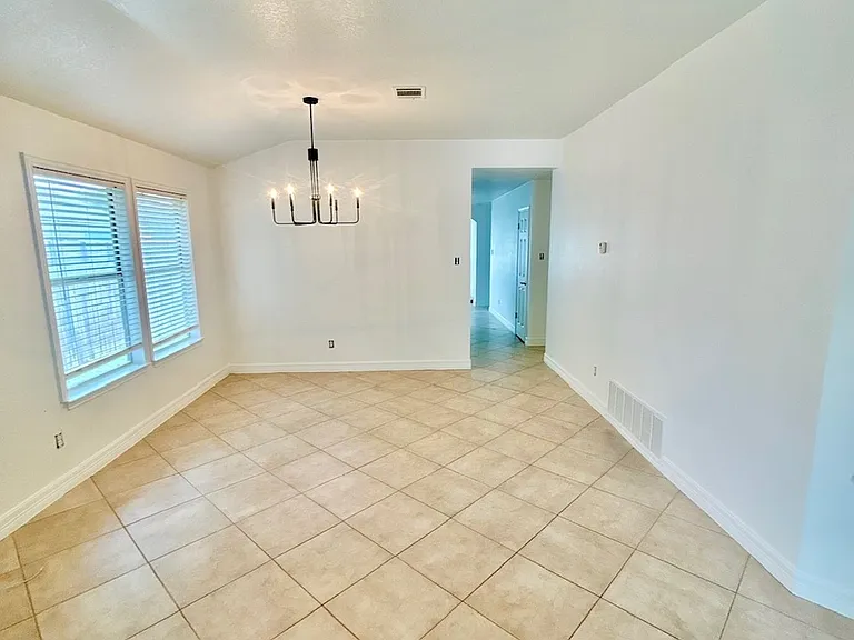 Formal dining room attached to front living room.
