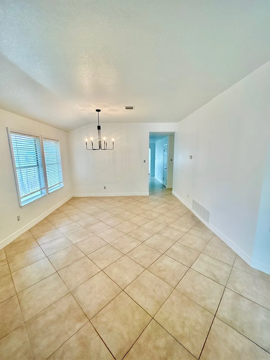 Formal dining room attached to front living room. - 2805 Sydney Dr