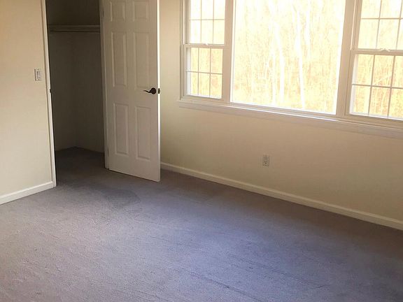 Mini walk-in closet in the 2nd bedroom.