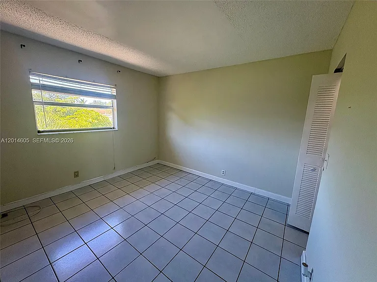 651 NW 42nd Ct #214 — Photo 15