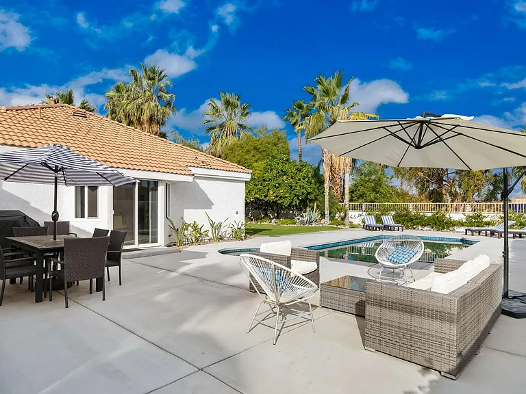 More seating by pool/spa.