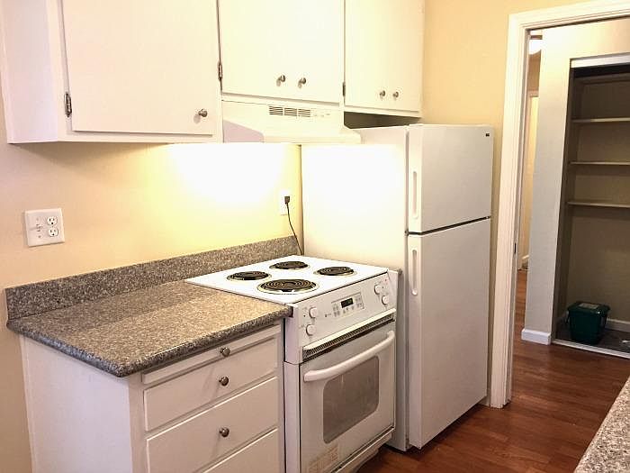 206: Kitchen with granite and new vinyl floor